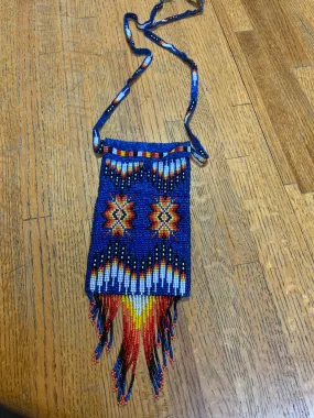 Handcrafted glass seed bead crossbody bag, 4” wide x 10” long including fringe.  BZ502