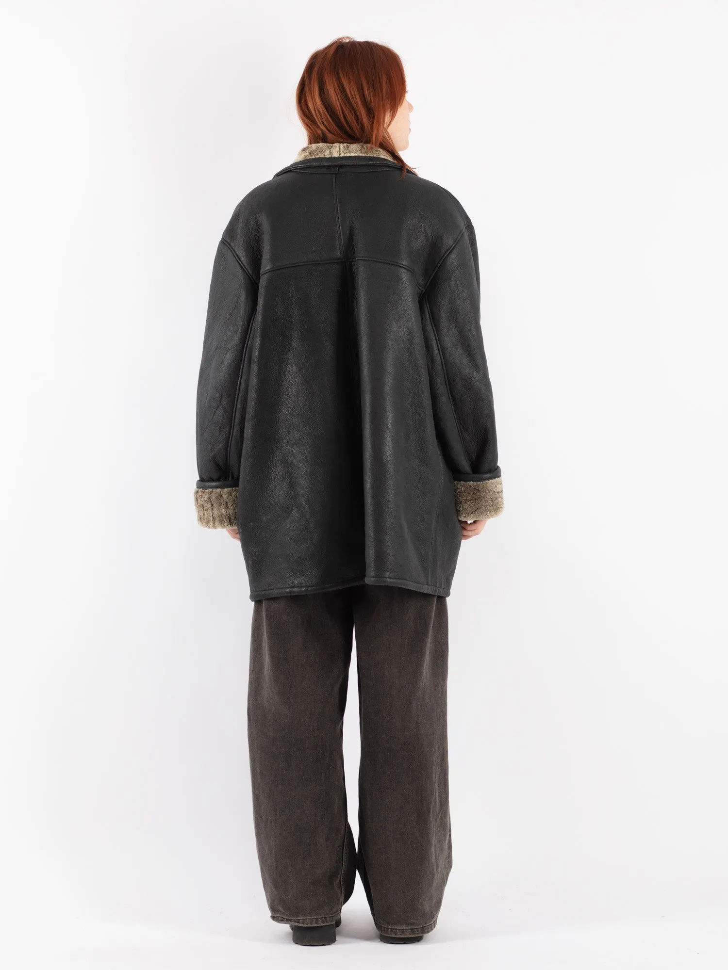 Vintage 90's Women Oversized Sheepskin Coat in Black